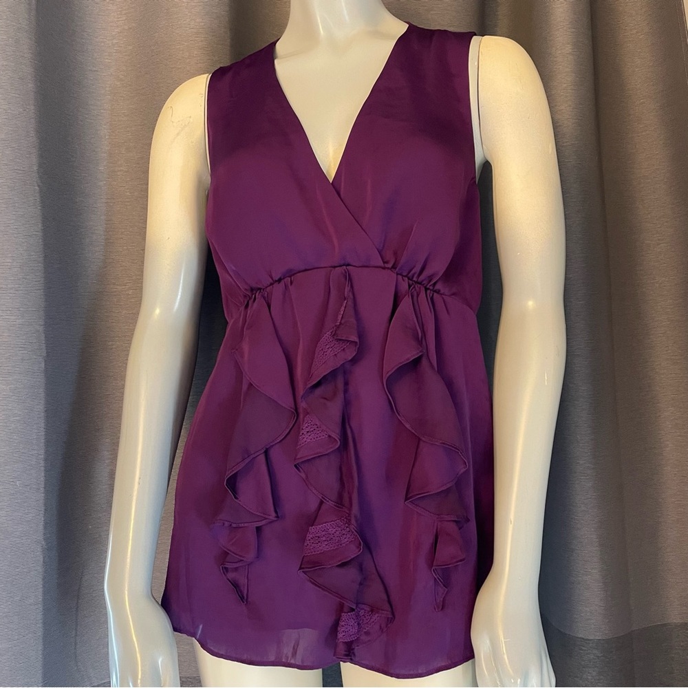 Like new Banana Republic heritage purple sleeveless ruffle top.  Size 8